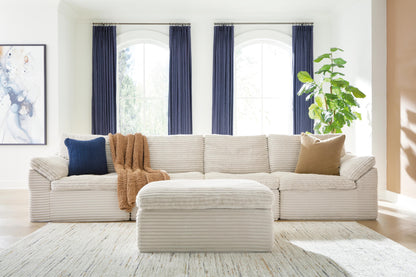 Lakeland Furniture Outlet - Ashley Furniture - Fannin Sectional - RAF 4-Piece Sectional with Ottoman / Ivory - PC84304S1