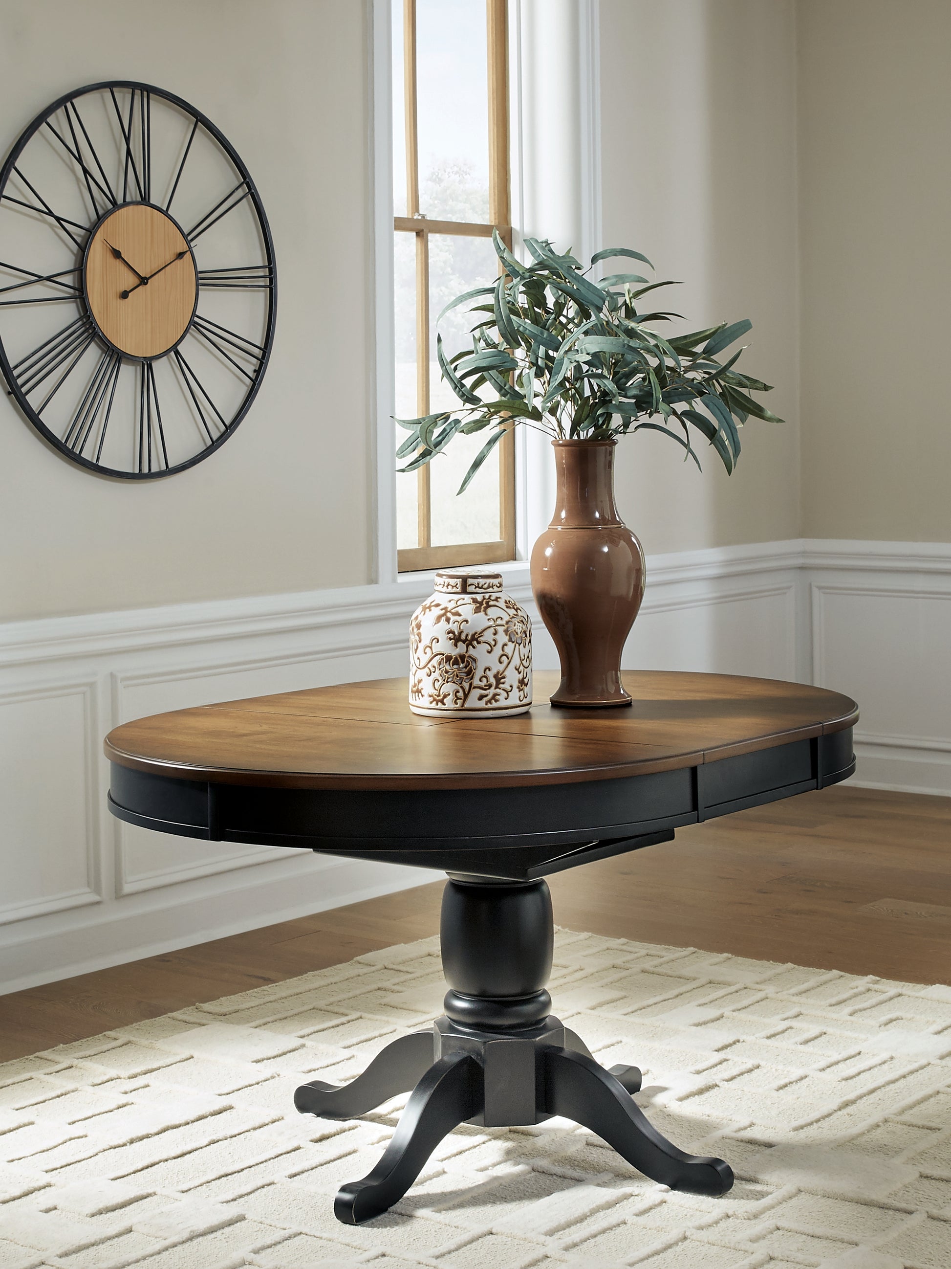 Lakeland Furniture Outlet - Ashley Furniture - Clorazi Dining Room - Oval DRM Butterfly EXT Table - PCD619-48