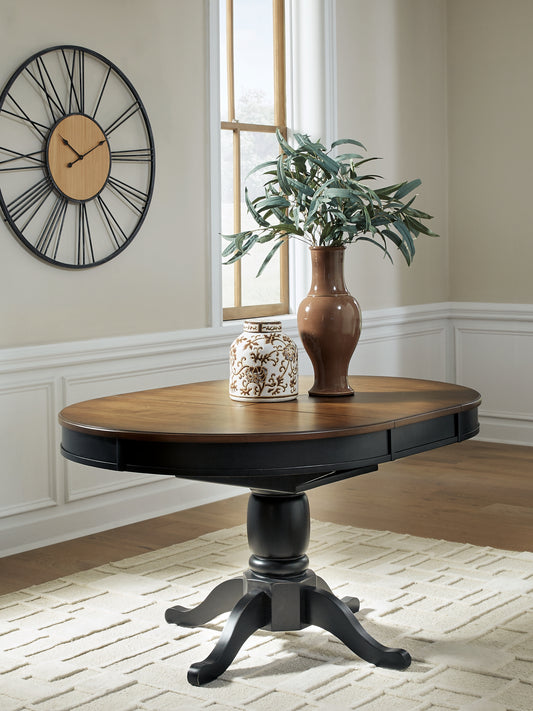 Lakeland Furniture Outlet - Ashley Furniture - Clorazi Dining Room - Oval DRM Butterfly EXT Table - PCD619-48