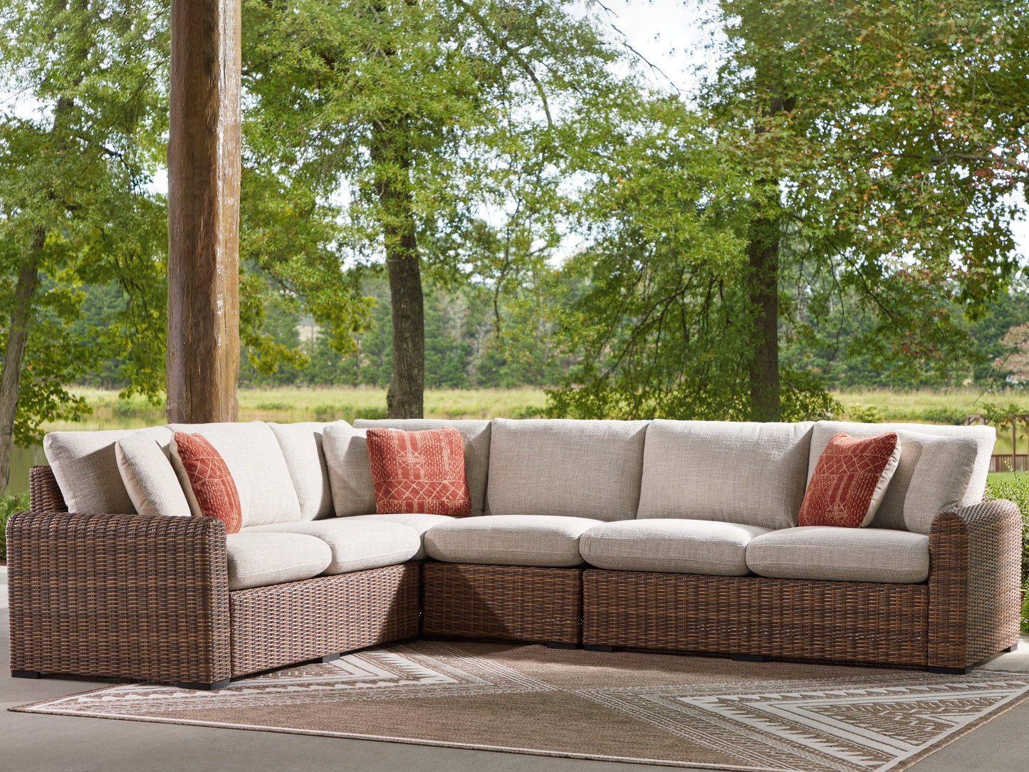 Lakeland Furniture Outlet - Ashley Furniture - Dolan Creek Outdoor - 4-Piece Outdoor Sectional / Beige/Brown - PCP610P2