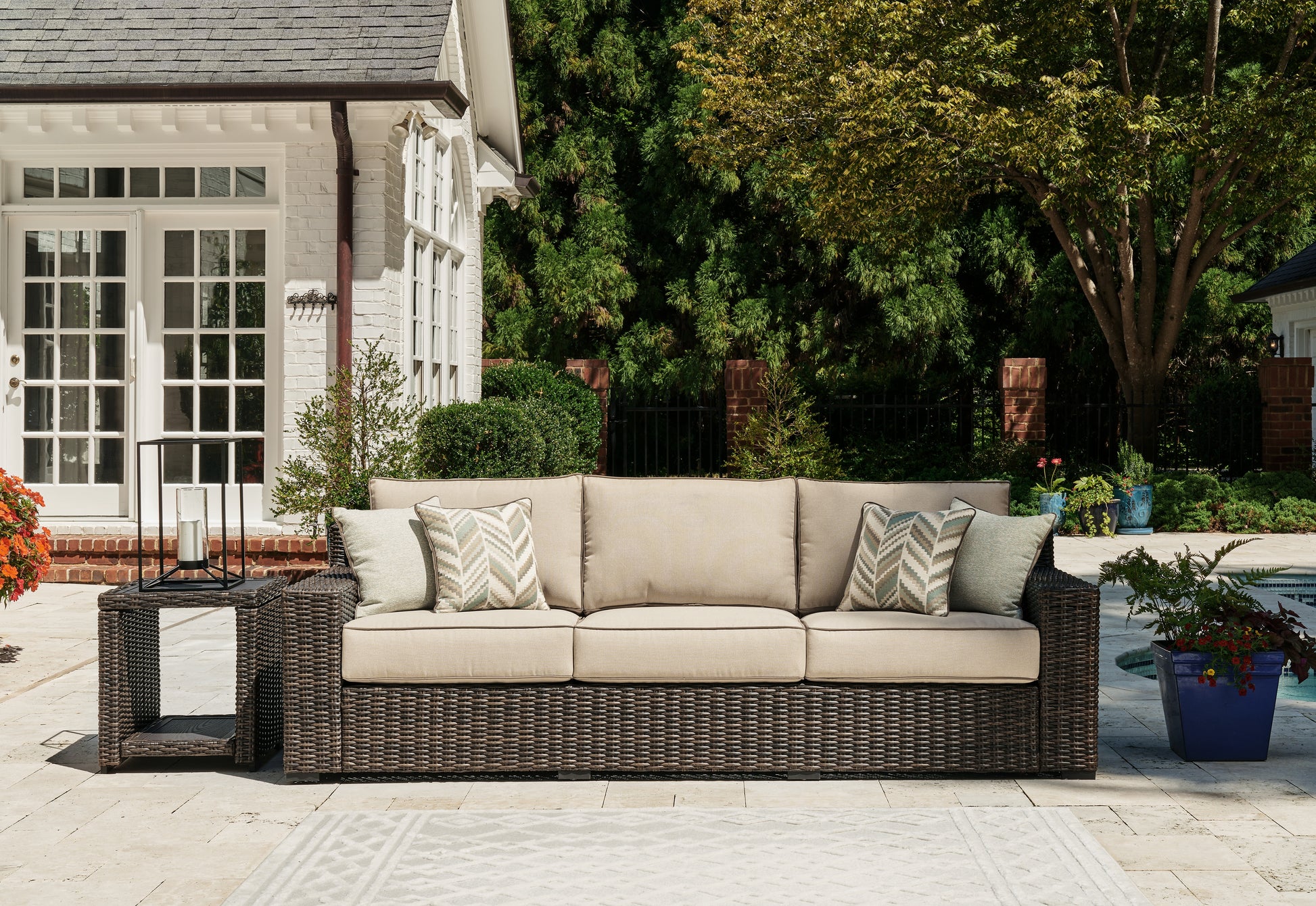 Lakeland Furniture Outlet - Ashley Furniture - Coastline Bay Outdoor - Sofa with Cushion / Brown - P784-838