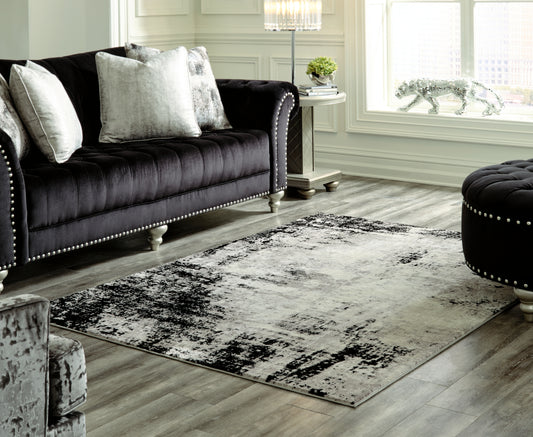 Lakeland Furniture Outlet - Ashley Furniture - Zekeman Rug - 7'10" x 10' Rug - R404921