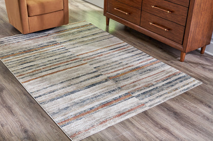 Lakeland Furniture Outlet - Ashley Furniture - Kemart Rug - 5' x 7' Rug / Multi - R406682