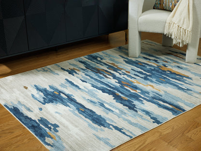 Lakeland Furniture Outlet - Ashley Furniture - Vinlett Rug - 5' x 7' Washable Rug / Cream/Blue/Brown - R407042