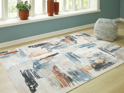 Lakeland Furniture Outlet - Ashley Furniture - Hessland Rug - 8' x 10' Washable Rug / Multi - R407051