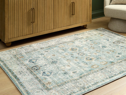 Lakeland Furniture Outlet - Ashley Furniture - Ladstoney Rug - 5' x 7' Memory Foam Area Rug / Teal/Beige/Ochre - R407502