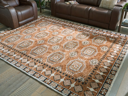 Lakeland Furniture Outlet - Ashley Furniture - Qaabiz Rug - 7'8" x 10' Area Rug / Sienna/Ivory/Black - R407521