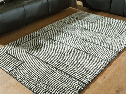 Lakeland Furniture Outlet - Ashley Furniture - Kurtmen Rug - 5' x 7' Area Rug / Black/Ivory - R407592