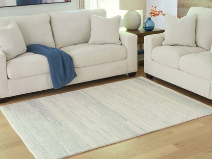 Lakeland Furniture Outlet - Ashley Furniture - Genemost Rug - 5' x 7' Area Rug / Ivory/Blue - R407842